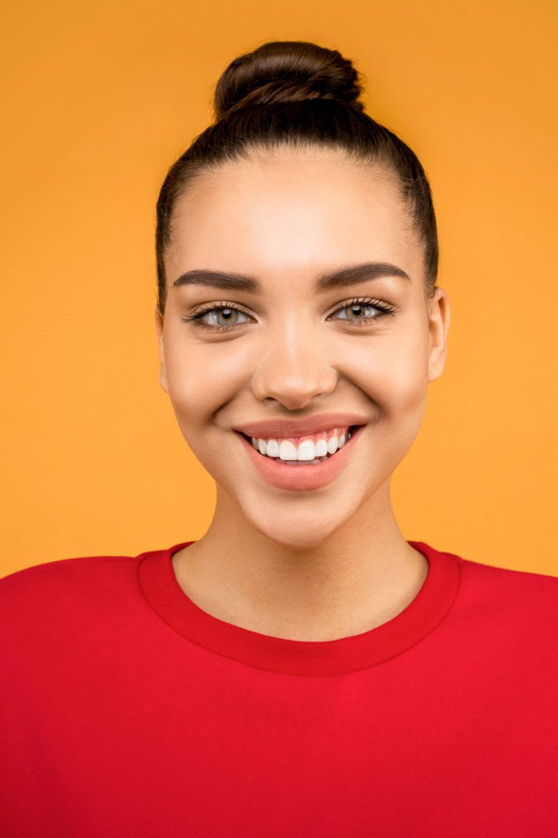 smiling-woman-in-red-crew-neck-shirt-3760706-1